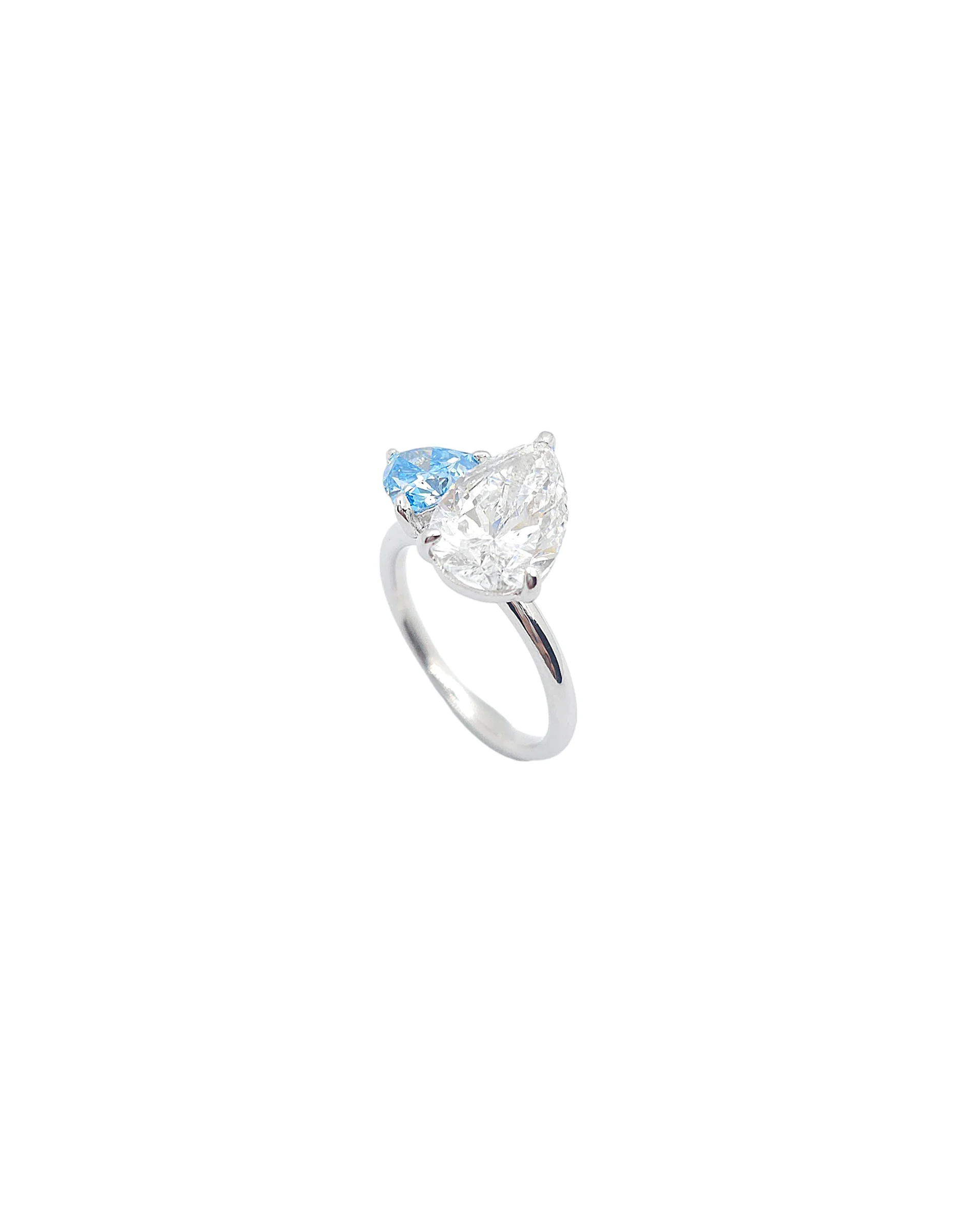 Platinum Pear Brilliant cut and Triangular Blue Lab Grown Diamond Ring